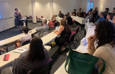 Lecture room with audience and seminar in progress