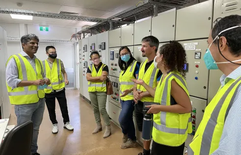 Charles Darwin University (CDU) has teamed up with Alice Springs Future Grid to integrate more renewable energy into the power grid of the Central Australian town.  Pictured: CDU’s Energy and Resources Institute Director Professor Suresh Thennadil (right).