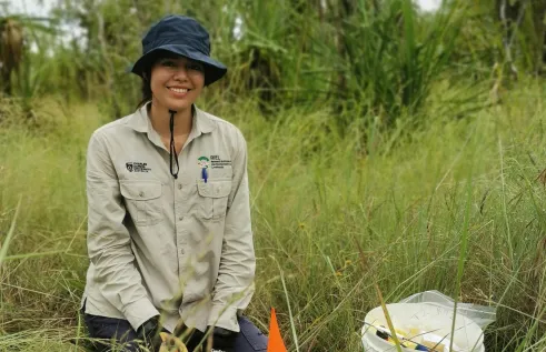 Alyson Malpartida in grass with white bucket