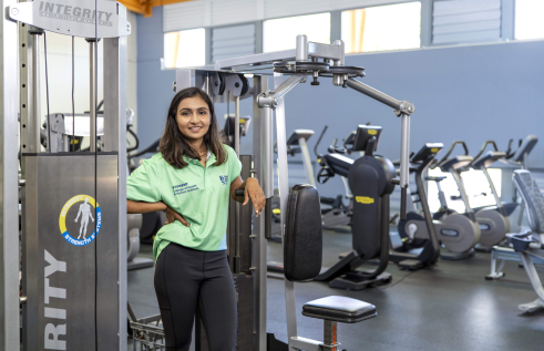 Girl next to gym machine