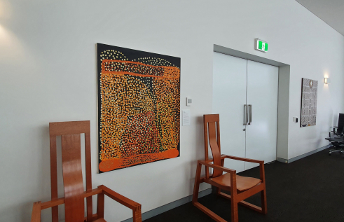 Mick Ricktor’s painting “Pila nguru”, 2018 and “Morning star”, 1995 by Robyn Mununggurr are featured in the Council Room, Chancellery, Casuarina campus, CDU.