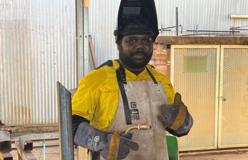 First Nations Jawoyn man learning welding techniques at CDU Katherine.