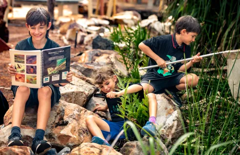 National Science Week will run from August 12 to 20 across Australia with a wide range of activities for all ages to enjoy. From L-R: Miguel Clark, Eleanor Hallett and Rafael Clark are in an epic quest for bugs.