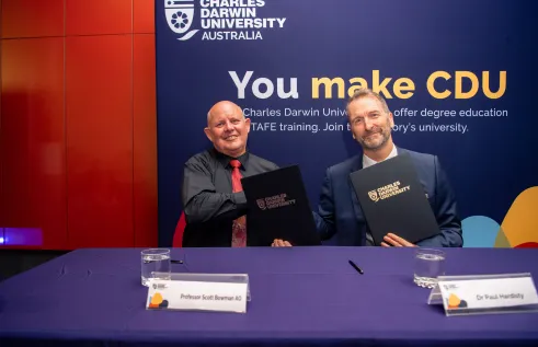 A new Partnership Agreement ‘AIMS@CDU’ has been signed between Charles Darwin University (CDU) and the Australian Institute of Marine Science (AIMS) to benefit the Northern Territory’s marine science research community. Pictured; CDU’s Vice-Chancellor Professor Scott Bowman and AIMS CEO Dr Paul Hardisty