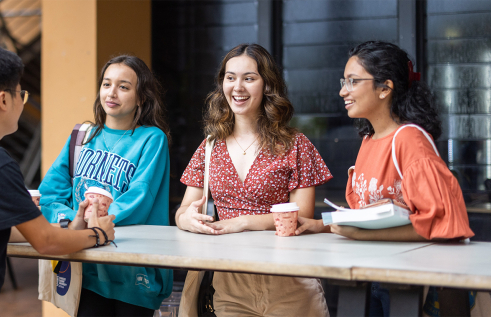 Image of a group of students around a table