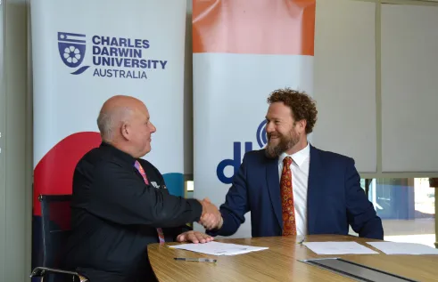 CDU VC and DKA CEO shaking hands