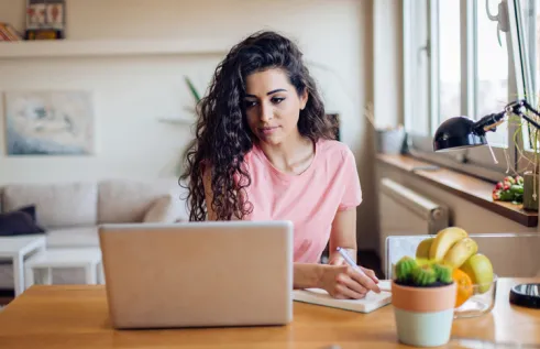 Female looking at a laptop