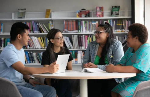 students sitting around a table at sydney campus