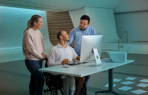 Entrepreneur Tarek in office space with colleagues