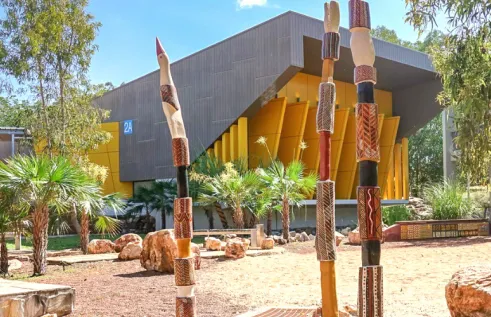 Blue 2 Ceremonial Space featuring Pukumani Poles