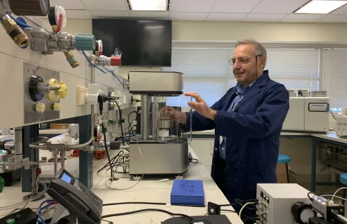Prof. Bogdan Dlugogorski in a blue lab coat at the ERI Chemical Lab 