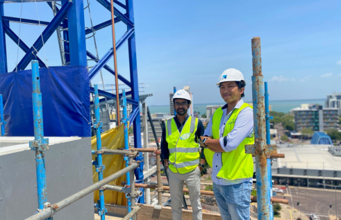 Master of Engineering students Kevin Gondaliya and Allen Glo are completing internships at the construction site of CDU’s new city campus, the Education and Community Precinct.