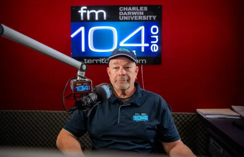 Volunteer Mark Stringer captivates listeners with his unique blend of blues music knowledge and passion on the airwaves of Charles Darwin University (CDU)’s community radio station Territory FM.