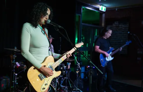 band on stage performing