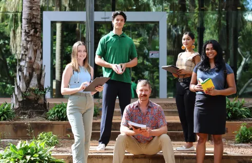 5 medical students on stairs 