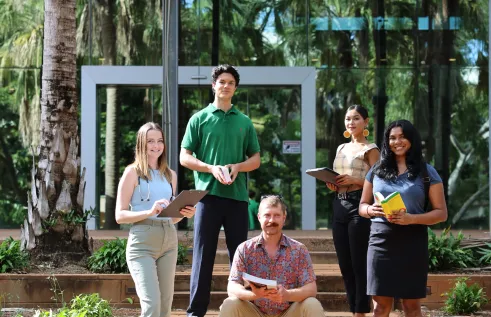 5 medical students on stairs 