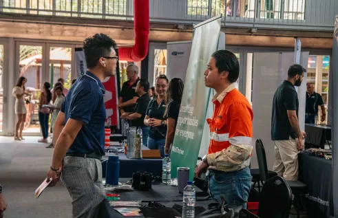 man stands at expo both