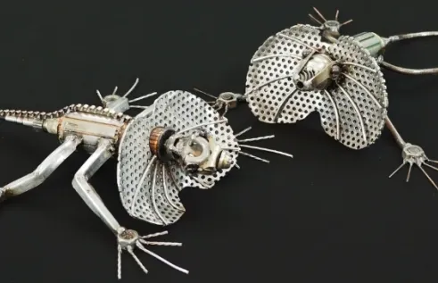 two sculpted lizards 