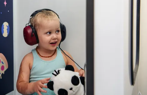 Audiology student performing paediatric screening