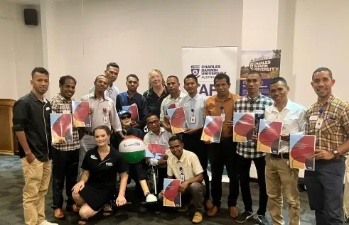 Aged Care students pose in classroom