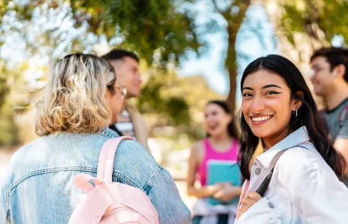 A group of students chatting happily