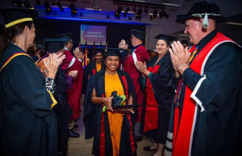 PALM students leaving ceremony at 2025 Katherine graduation.