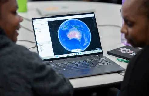 two people looking at map