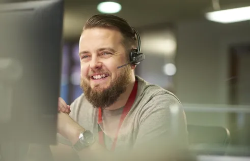 man on phone in service centre