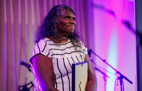 Yalmay Yunupiŋu on stage at Alumni Awards