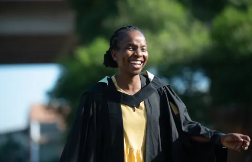 female student celebrating graduation