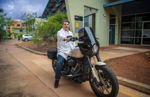 Alexander TEP Student on bike 