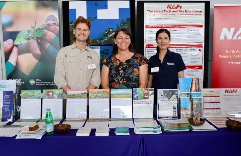 Honours student Jamie McHugh, Kerry Crosbie from NAFI and Sofia Oliveira from the DCBR share information about CDU’s research and study opportunities during the 2026 Savanna Fire Forum. 