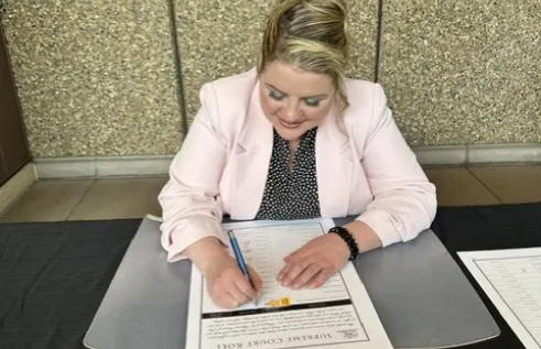 samantha alexander signing the supreme court role
