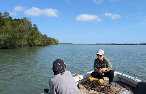 Two people on boat in a sea