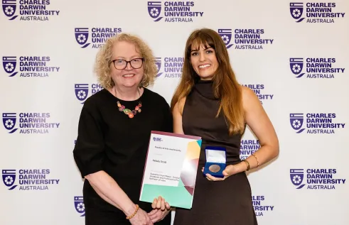 Kelsey receiving award
