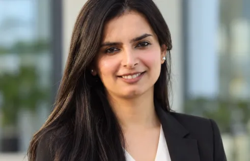 Photo of a Archisha Sharma smiling at camera