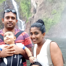 CDU student Chandu at a waterfall with her family
