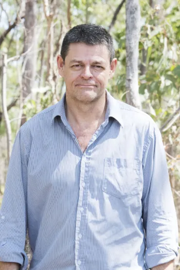 Lindsay Hutley head and shoulders with trees and leaves in background