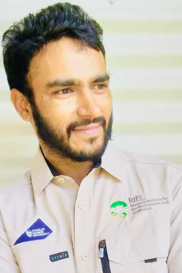 Dr Manoj Bhatta head and shoulders, wearing CDU / RIEL shirt