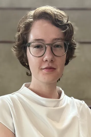 Female with white shirt and glasses