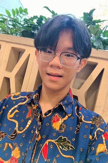 Male with blue print shirt