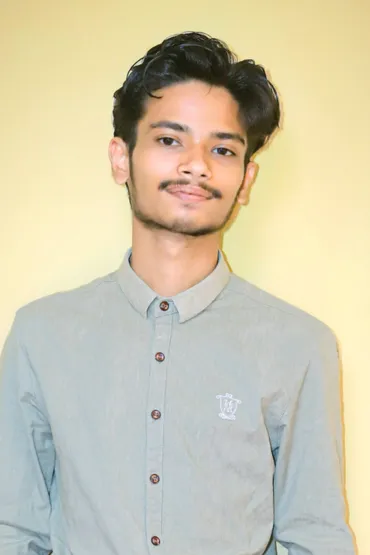 Male with a green collared shirt